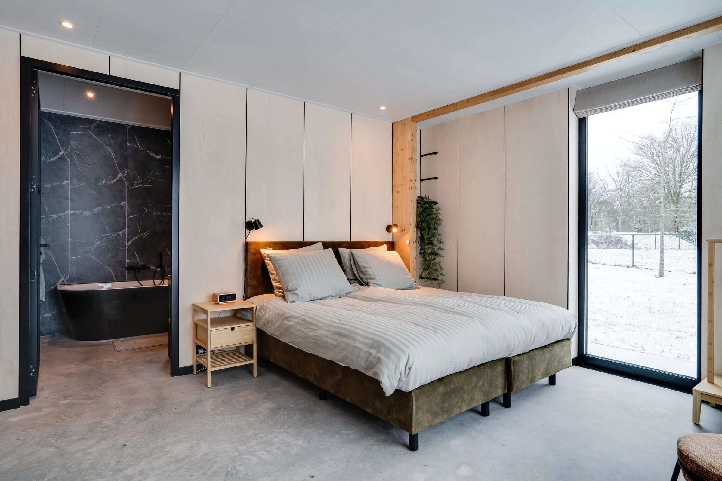 Master bedroom with forest views