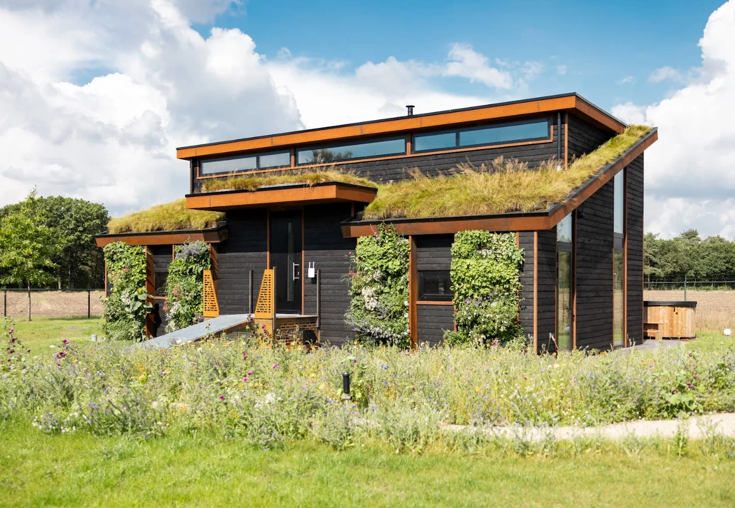 OplooPark forest house exterior with green roof